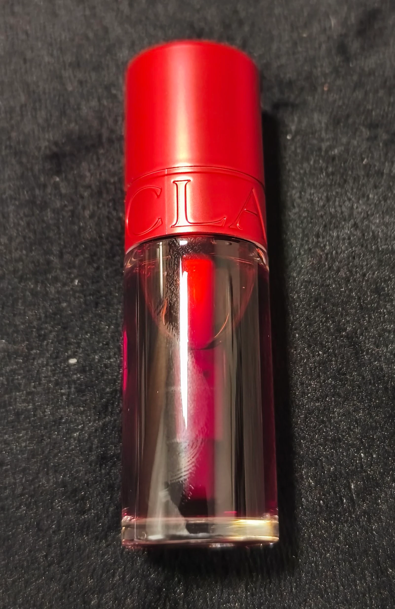 Neceser com batom da Clarins e cremes. – photo 12